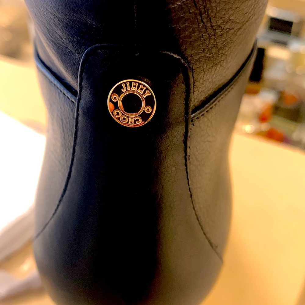 Brand new Jimmy Choo boots with original box and bag.